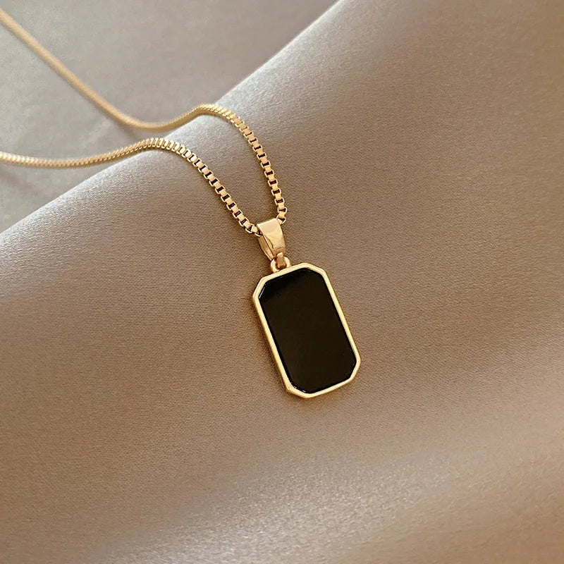 Elegant Black Gold Pendant Necklace